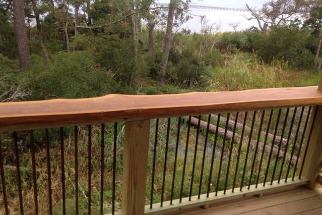 Top cap on porch made from local 200 year old Cypress!